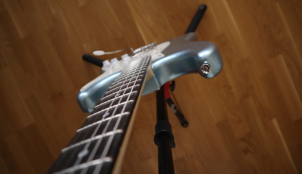 image displays playability and neck of Donner dst 152
